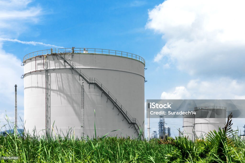 Oil refinery and Oil industry under blue sky Natural Gas storage tanks and oil tank in industrial plant under blue sky Fuel Storage Tank Stock Photo