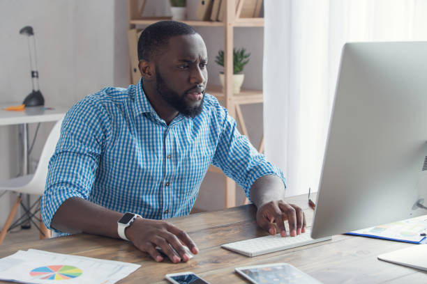 istock Young african man working in the office business 827527458
