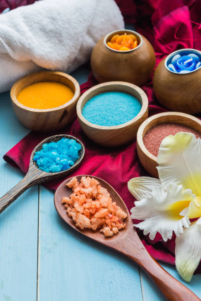 istock spa and massge items lay on blue wooden background 827527598