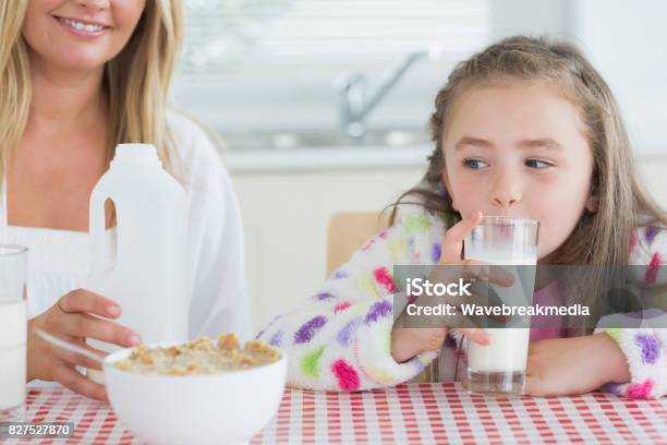 Little Girl Drinking Milk Stock Photo - Download Image Now - Ireland, Milk, 30-39 Years