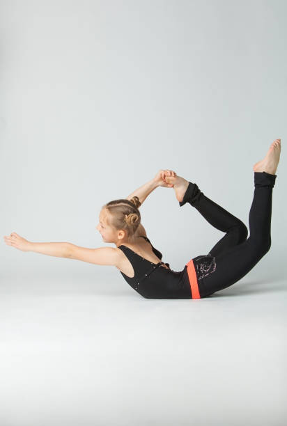 istock beautiful woman doing yoga on white background 827531312