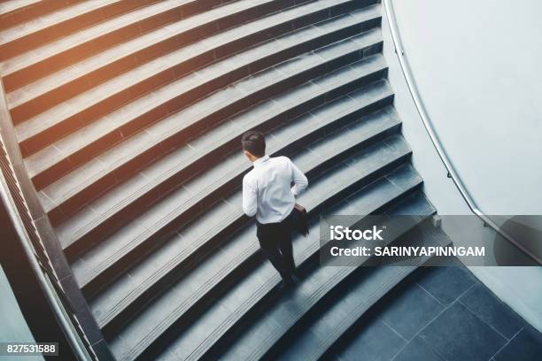 Businessman Running Fast Upstairs Growth Up Success Concept Stock Photo - Download Image Now