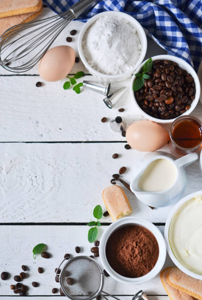 istock Ingredients for tiramisu on a white wooden background 827531664