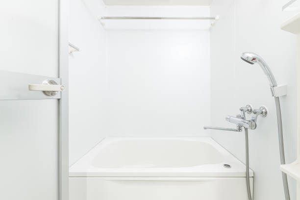 istock New white bathroom with bathtub and shower 827532068
