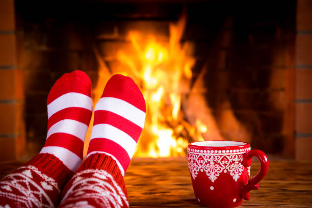 istock Christmas near fireplace 827544574
