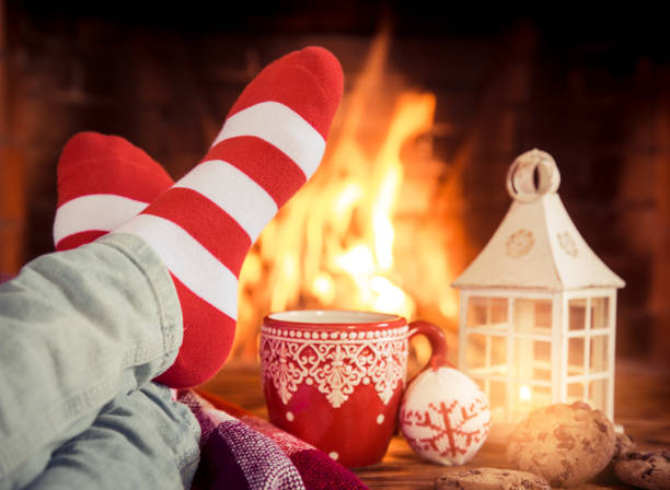 istock Christmas near fireplace 827544586