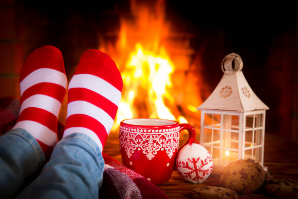istock Christmas near fireplace 827544588