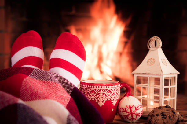 istock Christmas near fireplace 827544596