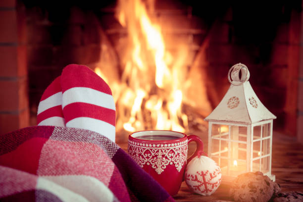 istock Christmas near fireplace 827544598