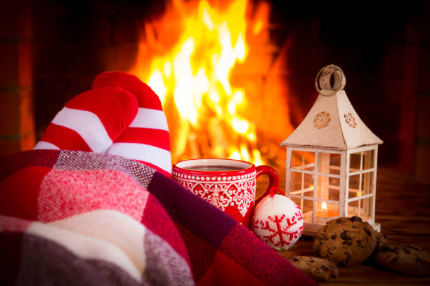istock Christmas near fireplace 827544600