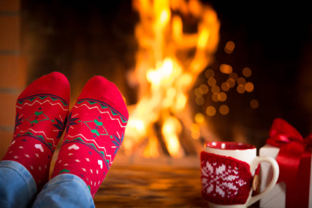 istock Christmas near fireplace 827544658