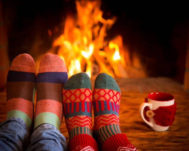 istock Couple near fireplace 827544660
