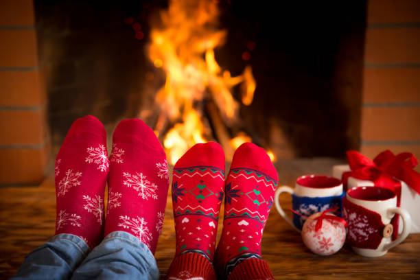 istock Couple near fireplace 827544664
