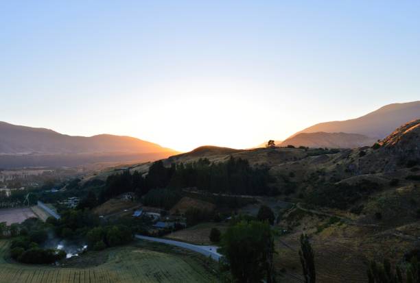 istock Sun burst through the valley: New Zealand 827550058