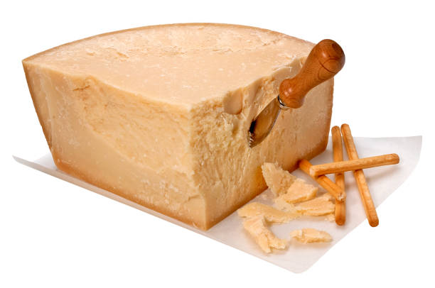 istock Piece of Parmesan cheese with knife. 827552754