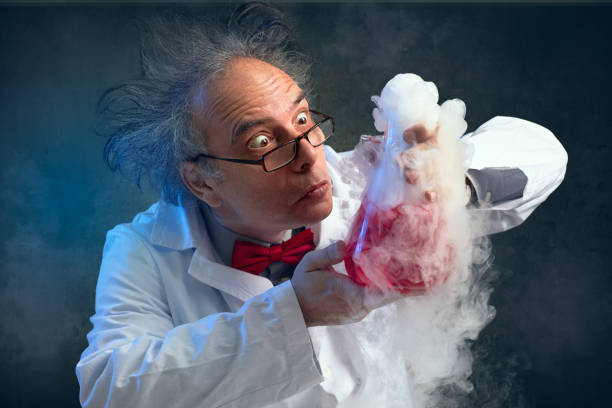 Crazy chemist smelling his experiment chemist crazy about his experiment smell his experiment alchemy photos stock pictures, royalty-free photos & images