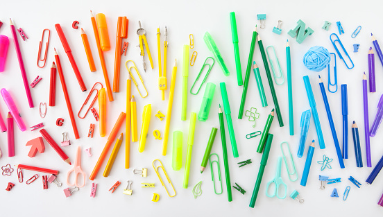 Colorful stationery in the color gradient of the rainbow