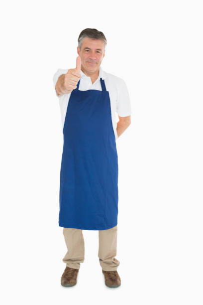 istock Man in apron giving thumbs up 827559724