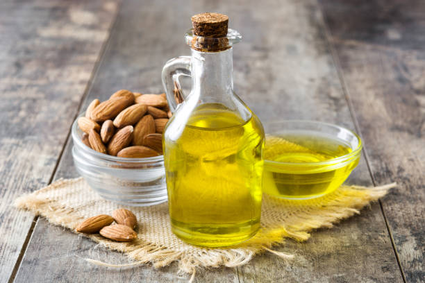istock Almond oil in bottle 827563908