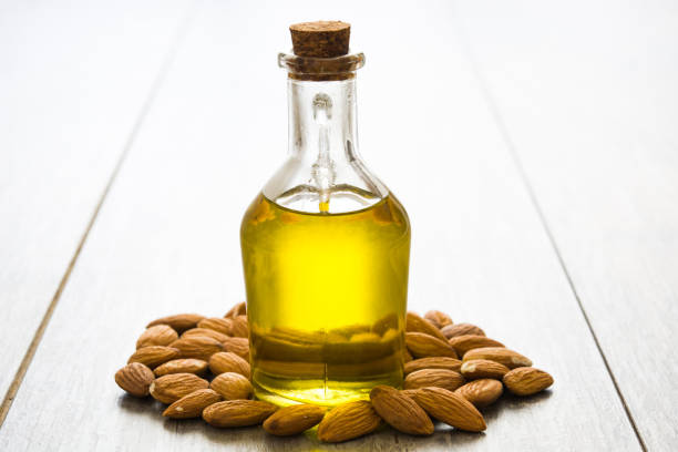 istock Almond oil in bottle 827564038