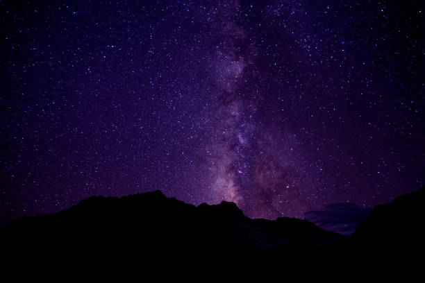 istock Silhouette of mountain with star in sky 827570590