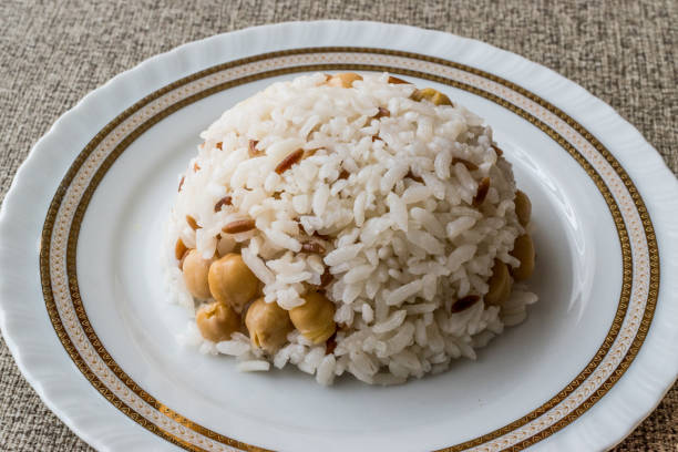 istock Turkish Rice with chickpea served with salt and pepper / Nohut Pilav 827571192