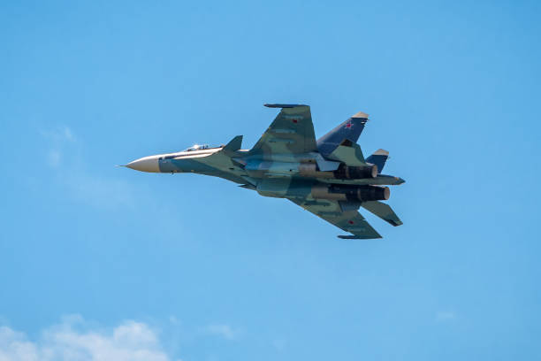 Russian strike fighter Su-30 at MAKS-2017 Moscow Region - July 21, 2017: Modern Russian strike fighter Su-30 flies in the blue sky at the International Aviation and Space Salon (MAKS) in Zhukovsky. moscow international air show stock pictures, royalty-free photos & images