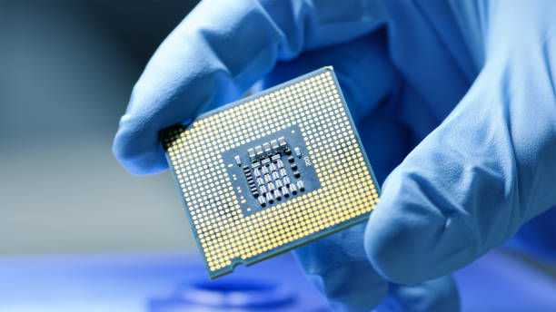 istock Close-up Presentation of a New Generation Microchip. Gloved Hand Holding Piece of Technological Wonder. 827572830