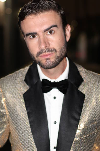 istock Posh man wearing a shiny outfit 827576146