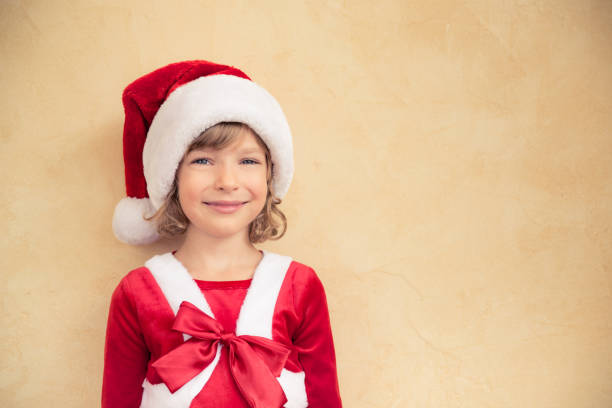 istock Child in Santa hat 827579088