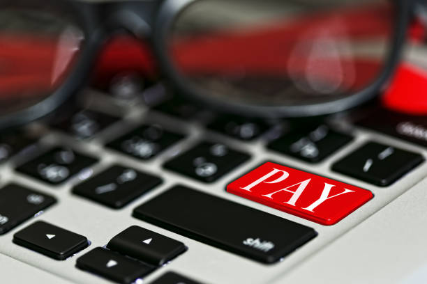istock Online payment concept with red color accent 827579514
