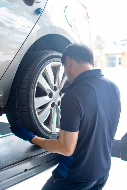 istock Replacement of automobile tires 827583216