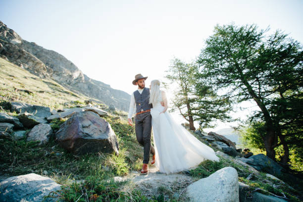 Wedding couple getting married in the mountains in Switzerland