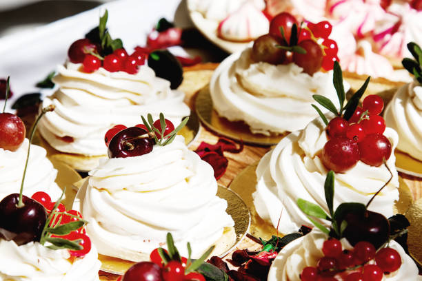 istock Candy bar with cakes, muffins, meringues, macaroons and biscuits 827588958