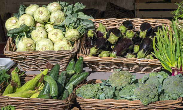 istock Kohlrabi, eggplant and broccoli for sale 827589350