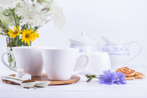 istock Medicinal plant chicory, Diet drink chicory in a cup with milk for breakfast. 827591622