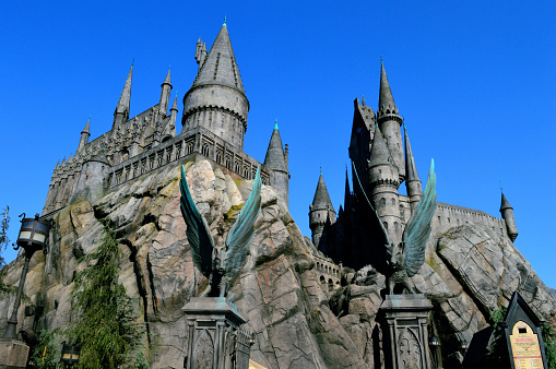 Los Angeles, California, USA - August 30, 2016: Hogwart Castle, The Wizarding World of Harry Potter with Blue Sky Background in Universal Studios at Los Angeles, California.