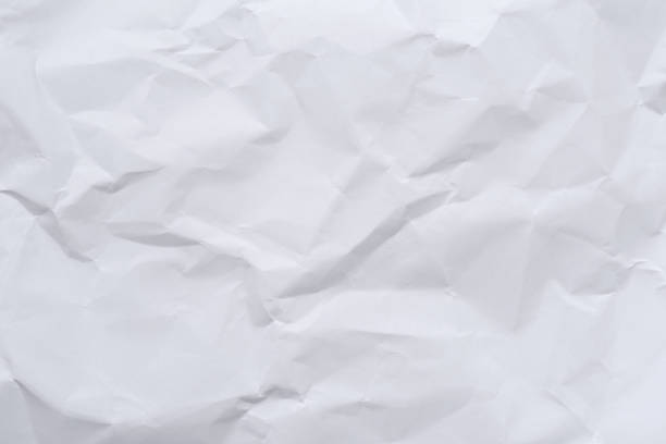 istock White crumpled paper background and texture 827595406