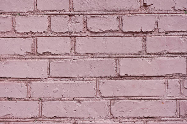 istock texture pink brick wall.Close. Old wall of a factory 827595934