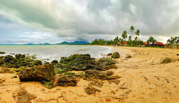 istock View of cloudy evening at tropical beach 827596468