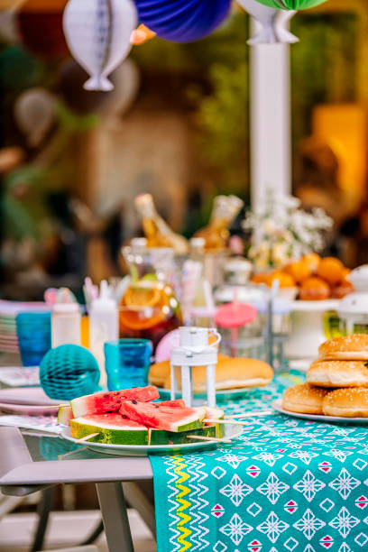 istock Decorated Party Table for Summer Backyard Party Outside 827599942