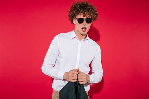 istock Stylish handsome guy in sunglasses and white shirt 827603184