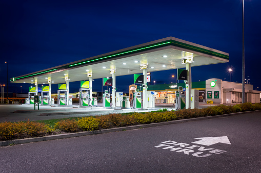 Szczecin, Poland - April 11,2017:BP gas station by night. BP gas stations and products including gasoline, diesel, motor oil, Szczecin, Poland