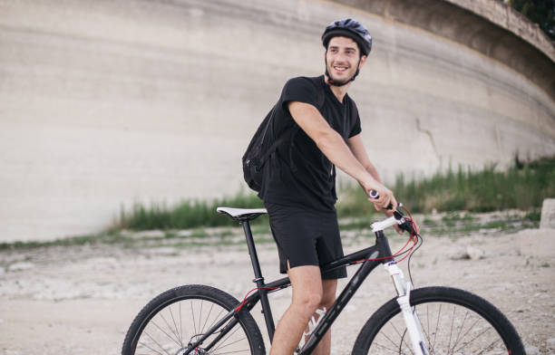 istock Man cycling in the summer 827605348