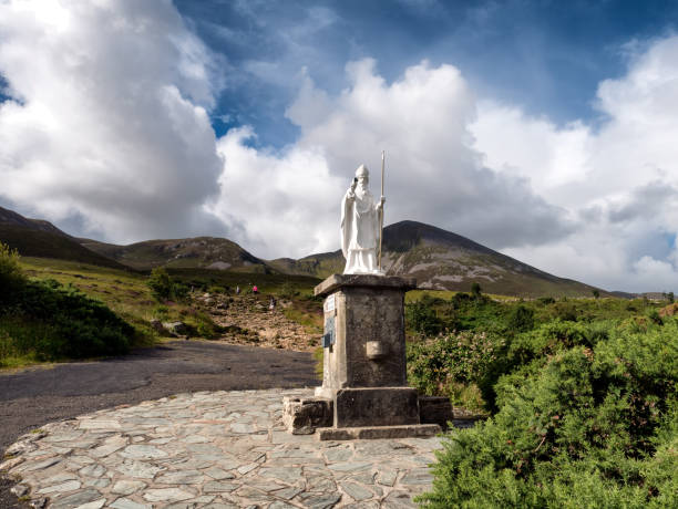 istock Pathway start with statue to Croagh Patrick in Westport Ireland 827611710