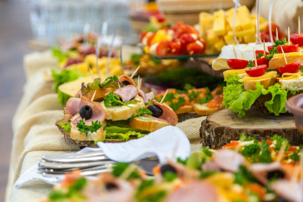 istock Banquet Table in restaurant served with different meals. 827614844