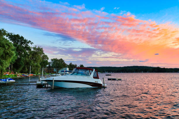 Lake Chautauqua New York tourism Sunsets on Lake Chautauqua are magnificent boat on lake stock pictures, royalty-free photos & images