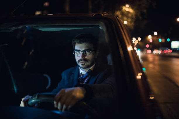 istock Businessman driving car 827627916