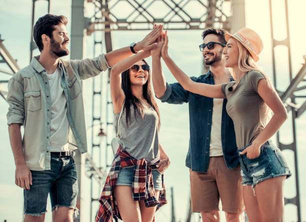 istock Young people walking outdoors 827628382