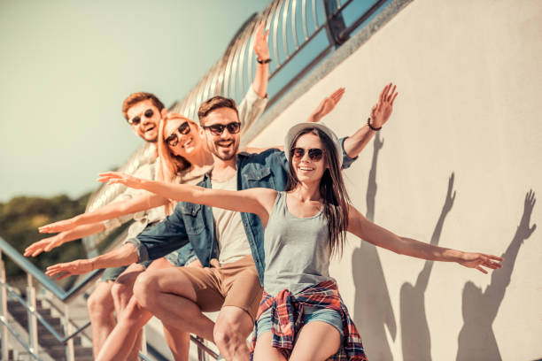 istock Young people walking outdoors 827631904